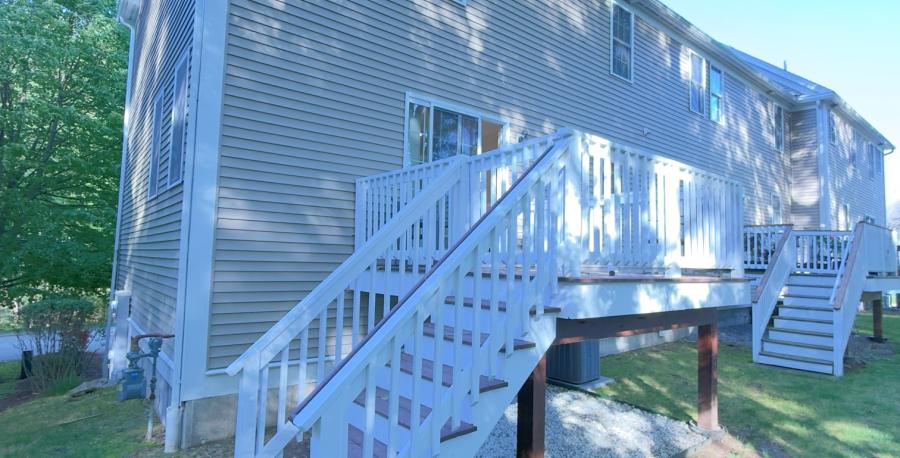 backyard with stairs to deck